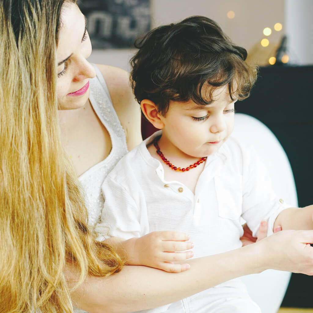 Calm Baby, Happy Mama & Amber Teething Necklace from Amber Guru in Cognac Color - Color Loved by Most Moms