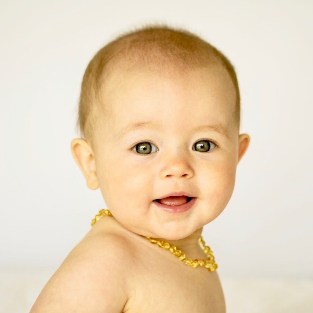 Happy Baby Wearing Premium Amber Teething Necklace in Lemon Color from Amber Guru