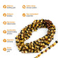 Infographic with a Bunch of Necklaces Showing Benefits of Amber Guru Multi Colored Baltic Amber Teething Necklaces with Polished Beads